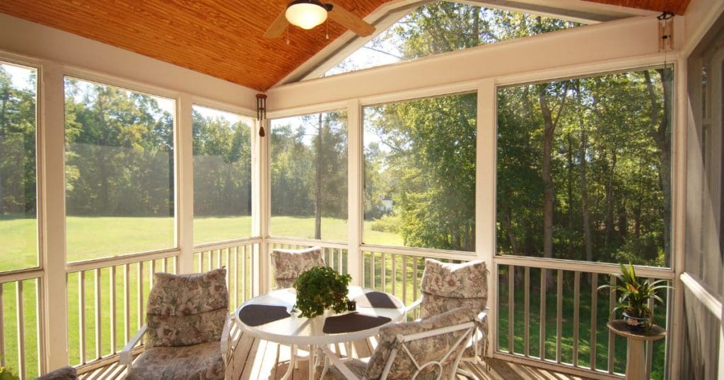 Screened patio with furniture