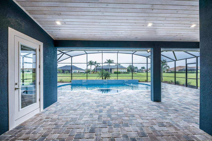 pool with screen enclosure for protection from storm